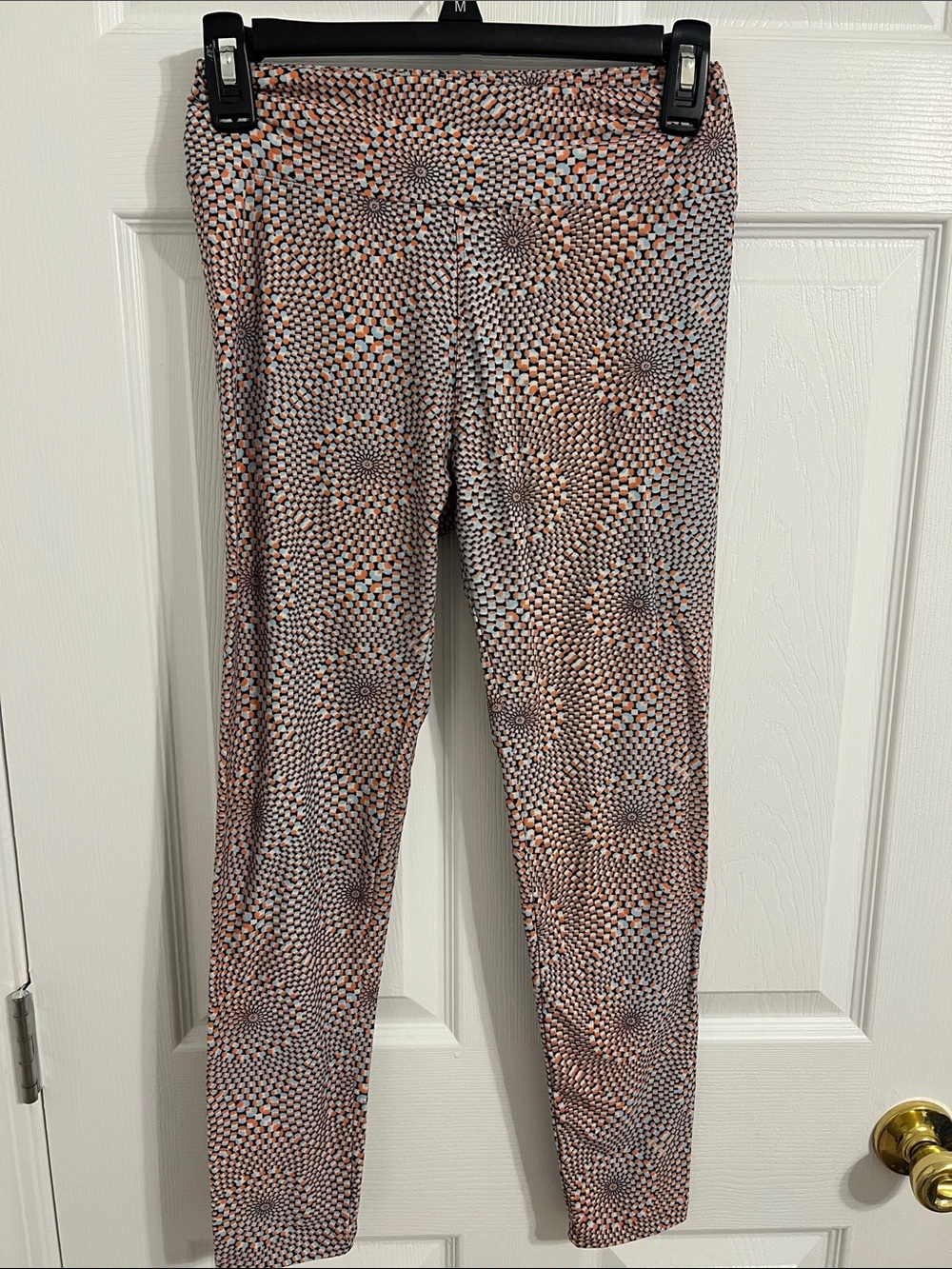 LuLaRoe Geometric Spiral Print Leggings in Black, Cream, Orange